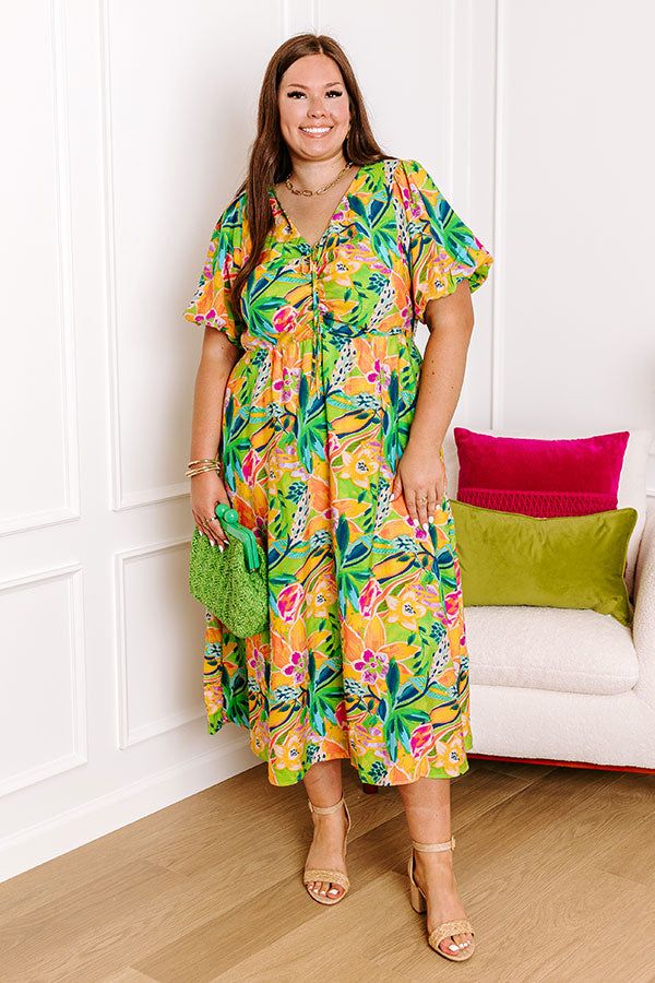 - Head to happy hour by the beach with this vibrant dress! - Lightweight material with a colorful abstract botanical print - A built-in partial lining ending - A v-cut neckline that goes down into a drawstring ruched bodice with a tie detail - Short puff sleeves with elastic cuffs - A waistline with an elastic back - Functional side pockets - A relaxed silhouette that ends in a straight hemline Vibrant Tropical Print Short Sleeve Dress, V-neck Midi Dress With Gathered Sleeves For Vacation, Vacation V-neck Midi Dress With Gathered Sleeves, Tropical V-neck Dress With Vibrant Print, Beach Midi Dress With Gathered Sleeves And V-neck, Vibrant Dress, Abstract Botanical, Ruched Bodice, The Maldives