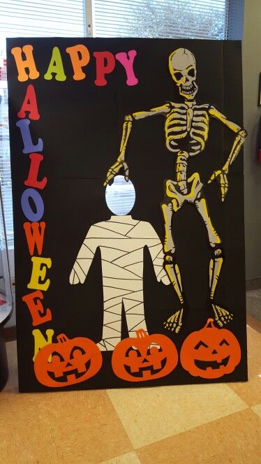 a halloween decoration made to look like a skeleton and a person in a pumpkin costume