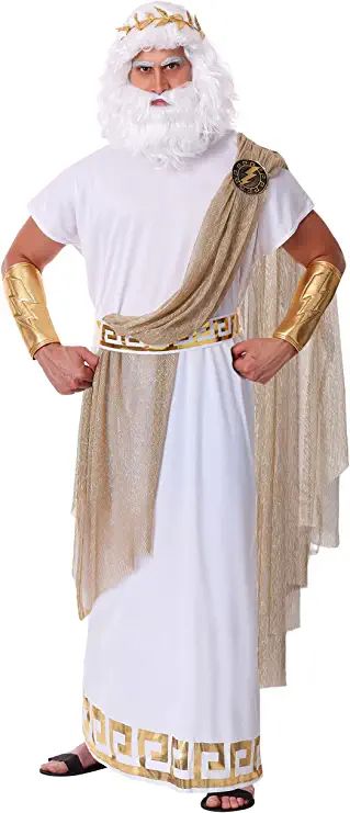 a man dressed in an ancient greek costume with his hands on his hips and wearing gold gloves