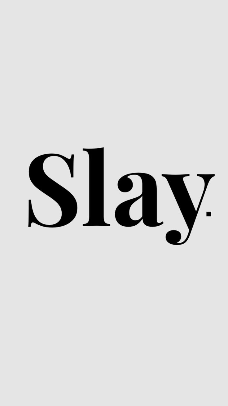 the word slay written in black on a gray background