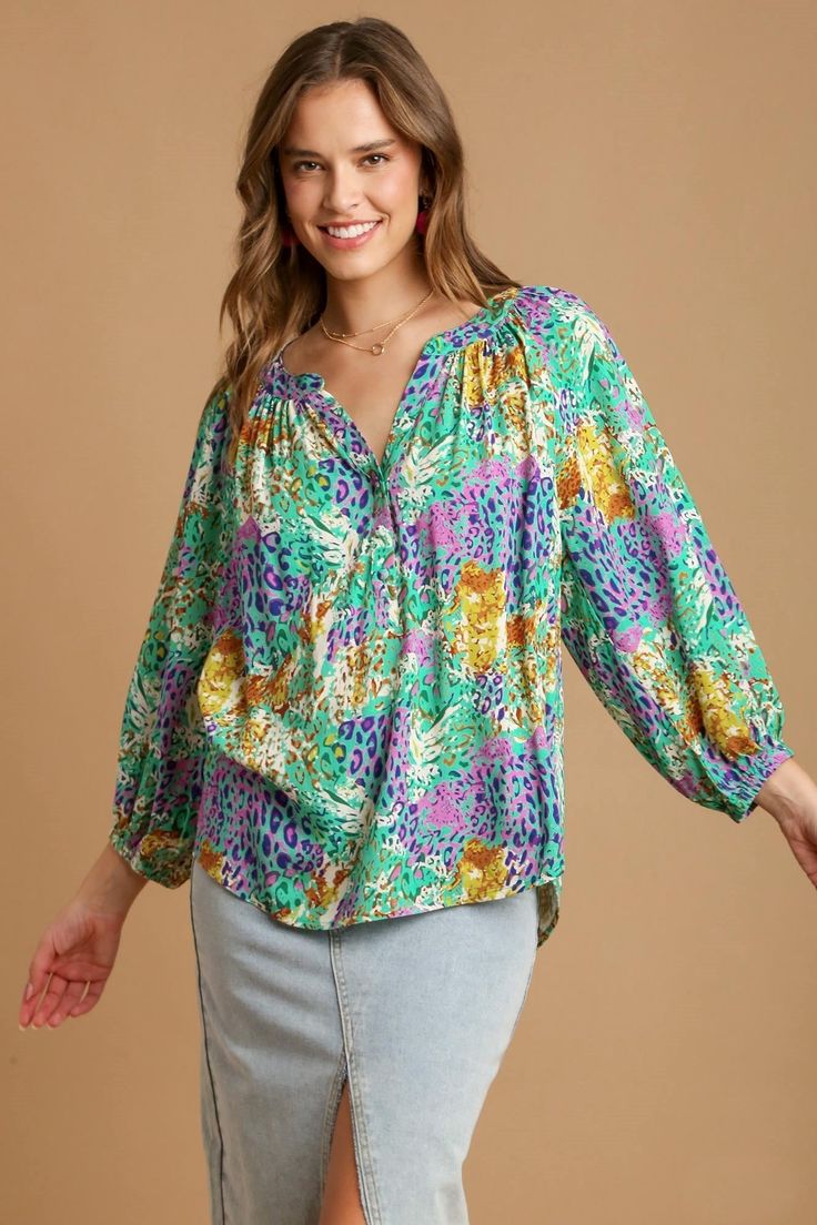 Umgee Mixed Print A-Line Top in Green Shirts & Tops Umgee Chic Floral Print Top With Split Neck, Chic Green Tops With Abstract Print, Spring Rayon Top With Split Neck, Chic Multicolor Viscose Blouse, Chic Green Blouse With Abstract Print, Spring Printed Split Neck Blouse, Patterned Long Sleeve Top With Mixed Print, Spring Printed Blouse With Split Neck, Long Sleeve Patterned Top With Mixed Print