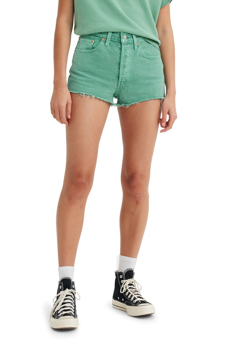 An eye-catching green wash refreshes the iconic style of nonstretch-denim shorts that define your waist and end in frayed hems. 2 1/2" inseam; 24" leg opening; 11" front rise; 16" back rise (size 29) Button fly Five-pocket style 100% cotton Machine wash, tumble dry Imported Denim Cutoff Shorts, Levi's 501, Iconic Style, Green Shorts, Levis 501, Cut Off, Short Outfits, Style Icons, Nordstrom Rack