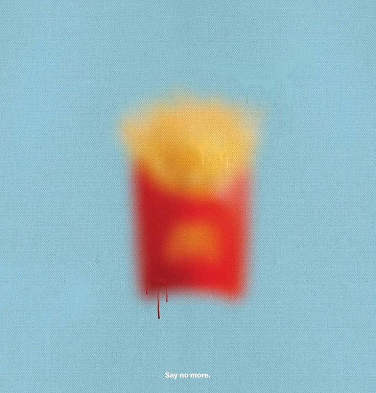 a blurry image of a red and yellow cup on a blue background with the words stay your mom written below it