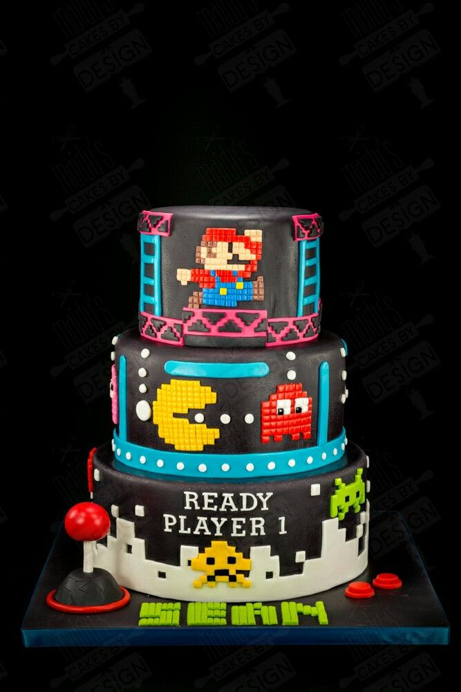 a cake that is decorated with video games