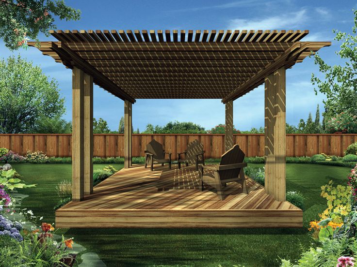 a wooden covered patio with chairs and tables in the middle of it, surrounded by greenery