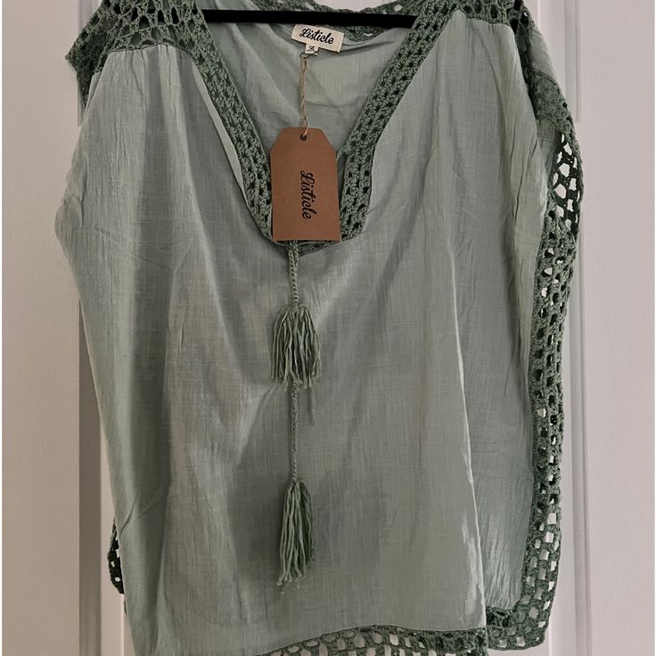 New With Tags! Light “Sage” Green Top. Super Cute! Summer Cotton One Size Tops, Green Casual One Size Tops, Chic Cotton Beach Cover-up Top, Casual Green Top For Beach Cover-up, One Size Green Top For Beach, One Size Cotton V-neck Top, Sage Green Top, Light Sage Green, Green Top