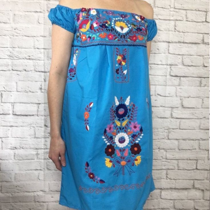 Size: Medium (See Measurements Below) Color: Sky Blue Dress With Multi-Colored Floral Embroidery This Is A Beautiful Handmade Dress From Oaxaca, Mexico. Material: Poplin Cotton Blend This Dress Is Light, Flowing & May Require A Slip Or Camisole Underneath. Measurements (Approximate): Length: 32 Inches Bust: 34 - 36 Inches Light Blue Embroidered Beach Dress, Casual Blue Embroidered Dress For Vacation, Light Blue Floral Embroidered Dress For Vacation, Light Blue Floral Embroidery Dress For Vacation, Light Blue Embroidered Summer Dress, Blue Floral Embroidery Summer Dress, Blue Floral Embroidery Dress For Vacation, Blue Floral Print Embroidered Summer Dress, Summer Blue Embroidered Floral Print Dress