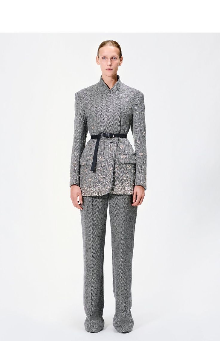 A modern take on the classic tuxedo jacket, this piece is meticulously crafted from 100% Italian wool herringbone in a sharp black and ivory hue. Intricate hand-embroidered crystals adorn the jacket, creating a striking pattern that elevates its timeless design. Featuring a horn button closure and two side pockets, this jacket combines elegant tailoring with a contemporary twist. Style Number: F24801WH Made in New York City Size & FitModel's Height: 5'10"Model is wearing size small Composition & Embroidered Crystals, Explore Houston, Classic Tuxedo, Adam Lippes, Twist Style, Tuxedo Jacket, Sweaters Knitwear, 2024 Collection, Fall 2024