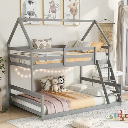 a child's bedroom with a bunk bed and toys