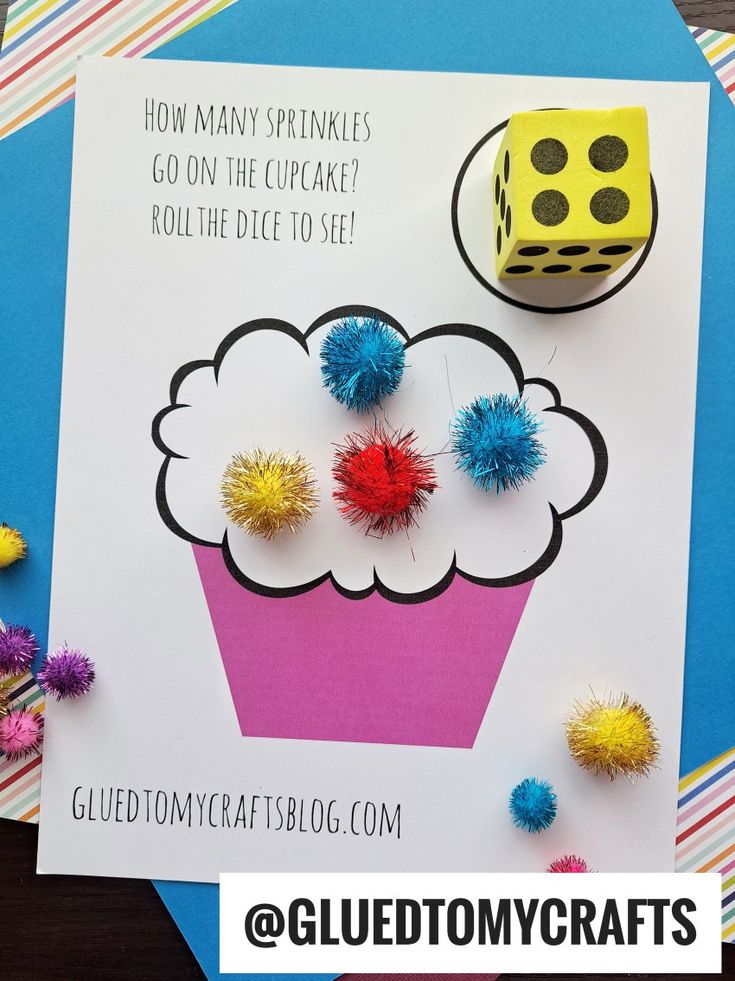 a card with some dices on top of it