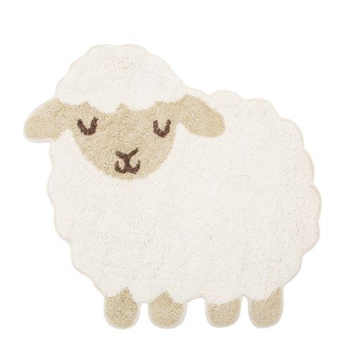 a white sheep rug with eyes closed on it's face and ears slightly down