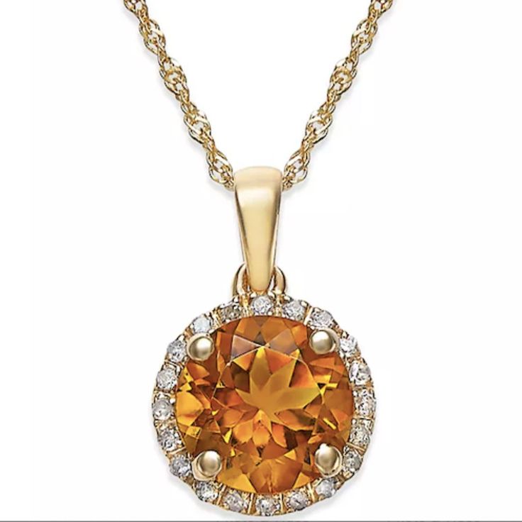 Upgrade Your Style With This 14k White Gold Pendant Necklace. The Round-Cut Citrine (1-1/2 Ct. T.W.) Is Surrounded By Dazzling Diamond Accents. Length: 18 Inches. Drop: 1/2 Inch. Timeless Shine For A Trendy Look! - Citrine: 1-1/0 Ct. T.W. - Diamond Accent - Set In 14k Yellow Gold (Garnet, Citrine) - Approx. Length: 18"; Approx. Drop: 1/2" - Spring Ring Clasp - Round Circle Citrine Gemstone Physical Composition: Citrine Is A Clear Yellow Variety Of Quartz. It Occurs In Proximity To Amethyst And T Gold Necklace With Round Cut Gemstone, Yellow Gold Citrine Jewelry With Round Cut, Yellow Gold Citrine Jewelry Round Cut, Elegant Citrine Round Stone Jewelry, Elegant Round Citrine Stone Jewelry, Yellow Gold Citrine Round Pendant Jewelry, Dazzling Yellow Gold Jewelry With Birthstone, Dazzling Yellow Gold Birthstone Jewelry, Exquisite Yellow Gold Birthstone Jewelry