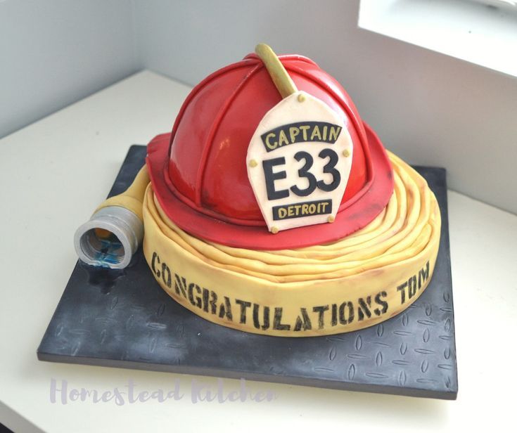 This sculpted helmet and fire hose cake was created for a retiring Detroit Fire Department Captain. Firefighter Grooms Cake, Firefighter Cake, Fire Engine Birthday, Fire Fighter Cake, Fireman Cake, Fire Cake, Firetruck Cake, Fireman Helmet, Firefighter Retirement