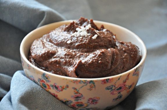 a close up of a bowl of food on a cloth