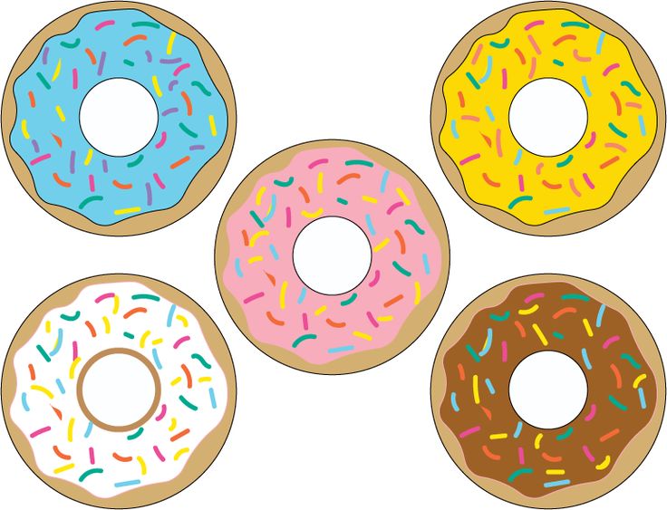 four donuts with different colored sprinkles on them