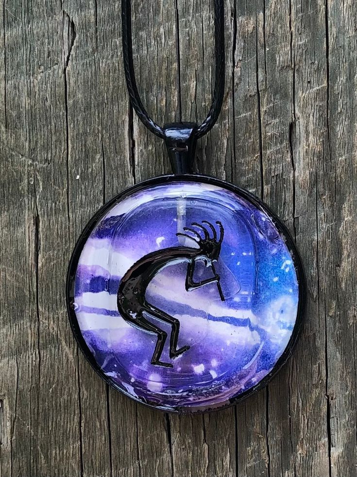 "Kokopelli Pendant Clear Quartz Kokopelli \" Cave Art\" Pendant over Original Gelli Print Art Kokopelli embedded in bezel with UV Resin Leather Adjustable Choker is 18 inches long" Artistic Nickel-free Purple Jewelry, Artistic Hand Painted Purple Jewelry, Artistic Purple Nickel-free Jewelry, Adjustable Hand Painted Spiritual Necklaces, Adjustable Hand Painted Necklaces, Adjustable Hand Painted Round Pendant Jewelry, Adjustable Round Hand Painted Necklaces, Adjustable Hand Painted Necklace, Adjustable Hand Painted Round Necklace