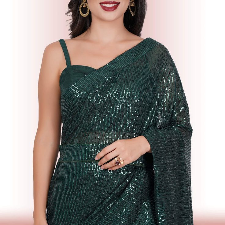 Introducing the exquisite "1 Minute Sequin Saree - Iridium"! ✨ Crafted from luxurious georgette, this saree combines timeless elegance with modern convenience. Designed for the busy fashionista, it comes pre-stitched for hassle-free draping. The dazzling iridium sequins glisten with every step, ensuring you steal the spotlight wherever you go. 💃Complementing this beauty is a classy spaghetti strap blouse that adds a touch of sophistication and allure to your ensemble. ✨Ideal for weddings, parti Elegant Semi-stitched Blouse Piece For Celebration, Elegant Georgette Blouse For Celebrations, Festive Formal Blouse Piece In Georgette, Elegant Evening Saree For Festivals, Elegant Party Saree For Festivals, Glamorous Georgette Saree For Festivals, Elegant Party Saree In Georgette, Elegant Party Georgette Saree, Georgette Saree For Evening Festivals