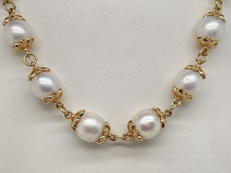 14k Yellow Gold Capped Pearl Necklace. It measures 18” long and weighs an impressive 52.6 Grams. The pearls measure around 9mm with some a little bigger. There are 22 pearls in the necklace. The lobster claw is hallmarked 14k and the pearl caps were acid tested 14k gold. A bold look fit for a queen. Formal 14k Gold Single Strand Necklace, Formal Single Strand 14k Gold Necklace, Classic 14k Gold Pearl Necklace, Luxury Round Custom Necklace For Formal Occasions, Luxury Formal Custom Round Necklace, Classic Single Strand Pearl Necklace In 14k Gold, Yellow Gold Necklace With High Luster Round Beads, Yellow Gold High Luster Round Beads Necklace, Elegant Custom Necklace With Polished Finish For Formal Occasions