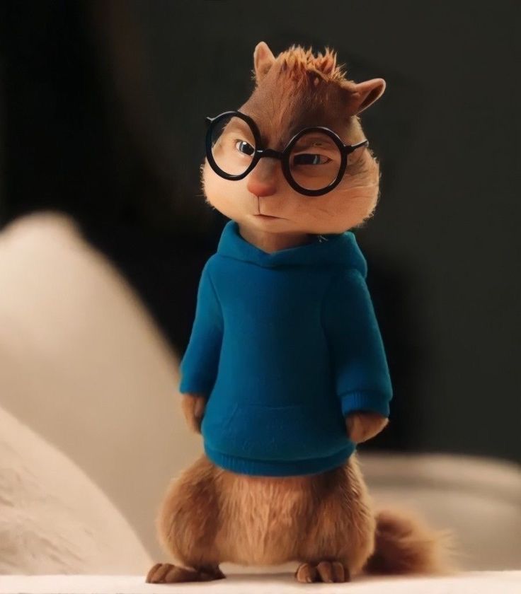 a cartoon squirrel wearing glasses and a blue shirt