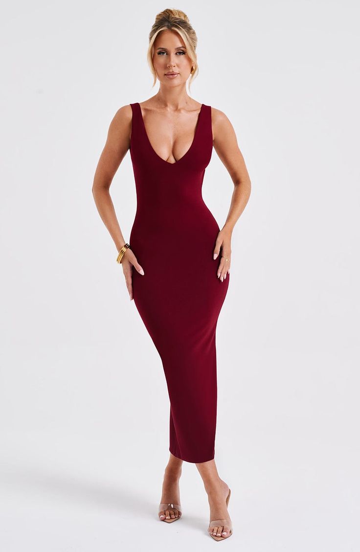 Meet the midi of the moment, Lucinda. Crafted in our premium stretch crepe fabric with a second skin fit, this midi dress has a plunge neckline, low scoop back and split in the centre back skirt. Style with tonal heels and a mini bag.


Colour: Burgundy.

Premium stretch crepe fabric.

Fully lined.

Moulds to the body figure.

Low scoop back.

Plunge neckline.

Split in centre back of skirt.

Invisible zipper.

Midi length.

Model is an XS and is wearing an XS.

 Size: XS, S, M, L, XL, XXL V-neck Midi Dress With Back Zipper For Date Night, Fitted V-neck Midi Dress With Back Zipper, Burgundy Fitted A-line Midi Dress, Fitted Burgundy V-neck Midi Dress, Stretch Brown V-neck Midi Dress, Homecoming Dresses Corset, White Dress Spring, Burgundy Midi Dress, Long Sleeve Homecoming Dresses