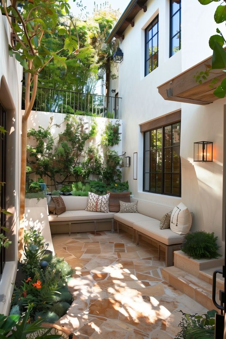 an outdoor living area with seating and trees