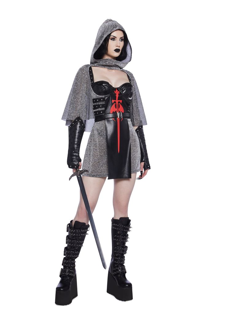 Fight Medieval crime with this costume set that includes a mini dress that has a mixed shimmery chainmail inspired mesh and vegan leather construction, an underwire bust, dome stud detailing on the sides and shoulder straps,a sword graphic on the front, Comes with a matching shimmery caped hood, a vegan leather belt, and matching gloves with stud details and thumbhole cuffs. Women Knight Costume, Androgynous Halloween Costumes, Vampire Halloween Costume Women, Knight Costume Women, Female Knight Costume, Women Viking Costume, Medieval Halloween Costumes, Fantasy Halloween Costumes, Medieval Inspired Outfits