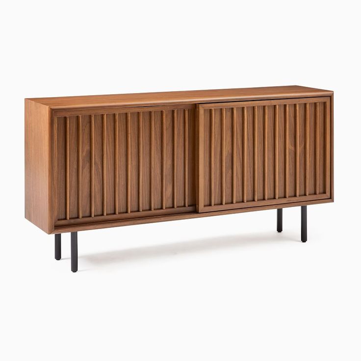 the sideboard is made from wood and has metal legs