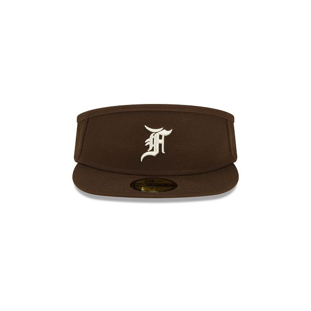 The Fear of God Essentials Walnut 59FIFTY Visor features an embroidered Fear of God logo at the front panels with the official MLB Batterman logo at the rear and a green undervisor. Brown Visor Hat For Streetwear, Brown Fitted Hat With Flat Bill For Streetwear, Brown Flat Bill Fitted Hat For Streetwear, Classic Baseball Cap With Logo Patch, Brown Curved Brim Fitted Hat For Streetwear, Brown Curved Brim Fitted Hat For Sports, Brown Flat Brim Fitted Hat For Streetwear, Collegiate Visor Fitted Hat For Streetwear, Fear Of God Logo