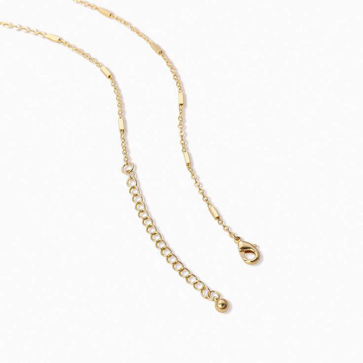 In our eyes, there’s nothing wrong with being a little bit of a drama queen. Put the attention on you with this necklace featuring gold bar details, exquisite gemstones, and a short lariat. Gold-tone Minimalist Lariat Necklace With Adjustable Chain, Minimalist Gold-tone Lariat Necklace With Adjustable Chain, Elegant Gold Charm Necklace With Adjustable Length, Gold Metal Lariat Necklace With Adjustable Length, Gold Dainty Necklace With Adjustable Length, Dainty Gold Necklace With Adjustable Length, Gold Minimalist Charm Necklace For Party, Minimalist Gold Charm Necklace For Party, Gold Long Adjustable Chain Necklace