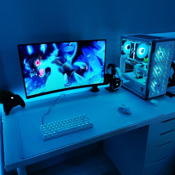 a desktop computer sitting on top of a white desk