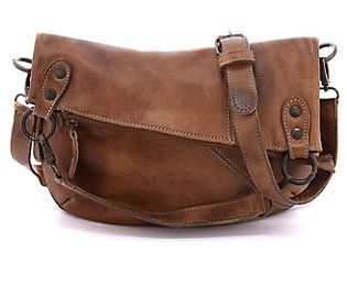 The rugged leather design and adjustable strap make this crossbody an absolute must-have. From BED STU.