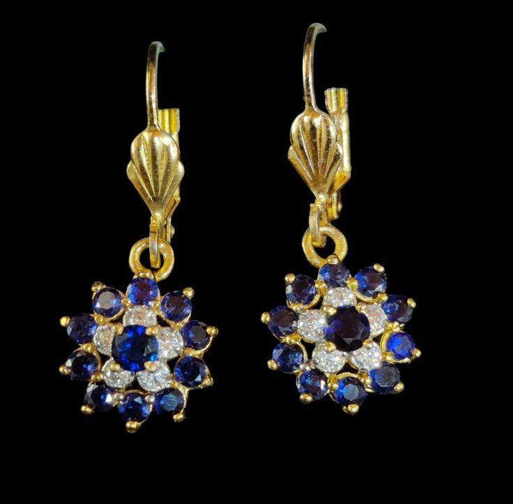 2.50 Ct Simulated Blue Sapphire Diamond 14K Yellow Gold FN Cluster Drop/Dangle Earrings Gold Purity:14k Yellow Gold Over Diamond Shape :Round  Gem Stone: Simulated Base Metal :925 Sterling Silver Color:Blue and White Tishya Jewellers Payment Policy 1.       Only PayPal is Accepted 2.       We accept all credit & debit cards. 3.       Payment needs to be completed within 3 days of purchase. 4.       Please contact us if you can't make the payment promptly. 5.       In case of Un payment we reserv Blue Diamond Dangle Earrings As Gift, Blue Round Cluster Earrings For Formal Occasions, Blue Diamond Drop Earrings For Gift, Blue Drop Earrings With Prong Setting, Blue Diamond Dangle Earrings For Gifts, Blue Diamond Drop Earrings With Prong Setting, Blue Dangle Diamond Earrings For Gifts, Elegant Blue Jewelry With Lever Back, Blue Drop Earrings With Lever Back