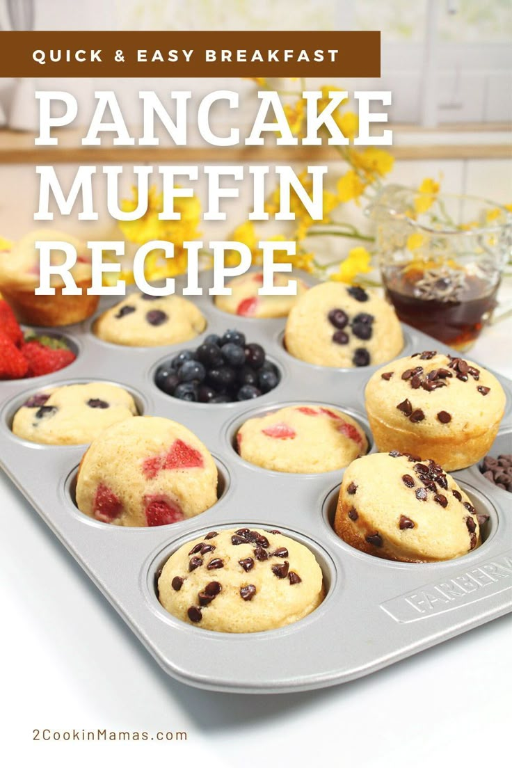 a muffin tin filled with blueberries and raspberry muffins on top of a counter