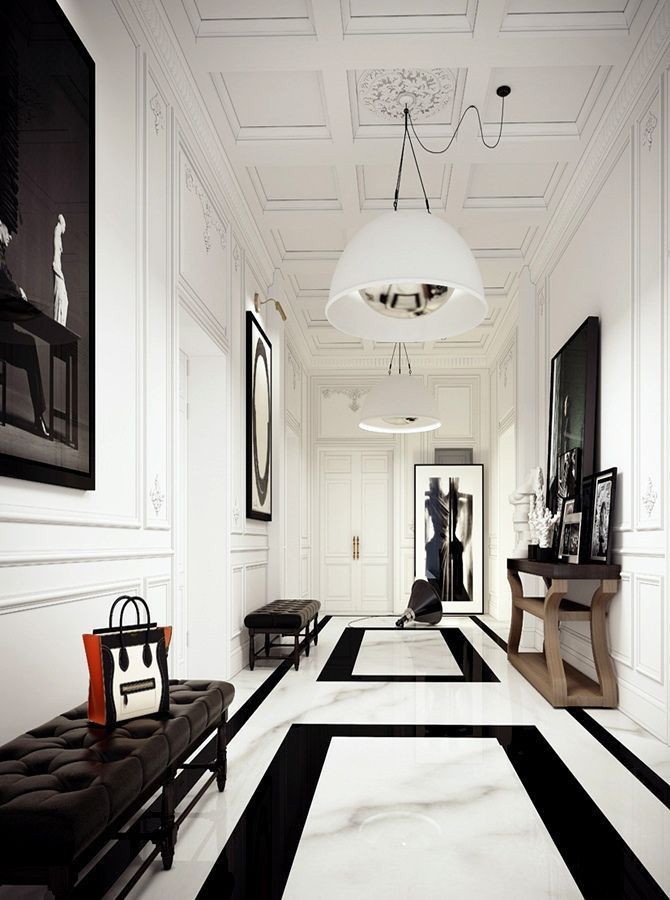 an image of a long hallway with black and white flooring on the sidelines