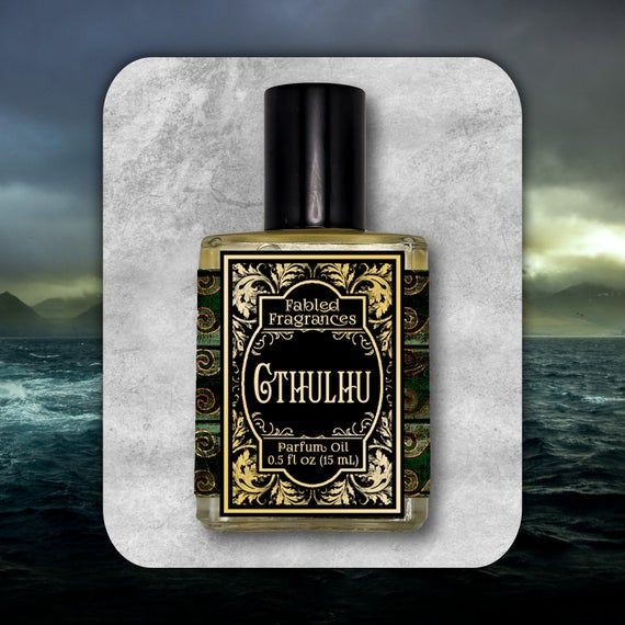 CTHULHU Perfume Oil𝐀𝐑𝐎𝐌𝐀: The clean scent of katrafay and the sweet green aroma of yarrow waft along turbulent ocean waves to settle on the sandy shore, where the essence of smoky giuac wood and precious, deep oud drift along the wind from a distant, dark forest. Hints of musk and fresh seaweed complete the dry-down.𝐀𝐑𝐎𝐌𝐀 𝐅𝐀𝐌𝐈𝐋𝐘: Clean/Aquatic Earth𝐆𝐄𝐍𝐃𝐄𝐑: Masculine𝐓𝐎𝐏 𝐍𝐎𝐓𝐄𝐒: Katrafay (natural), Yarrow (natural, organic)𝐇𝐄𝐀𝐑𝐓 𝐍𝐎𝐓𝐄𝐒: Verbena (natural, organ Haunted Woods, Spooky Gifts, Amber Bottles, Roll On Bottles, New Cosmetics, Black Currant, Black Currants, Clean Scents, Solid Perfume