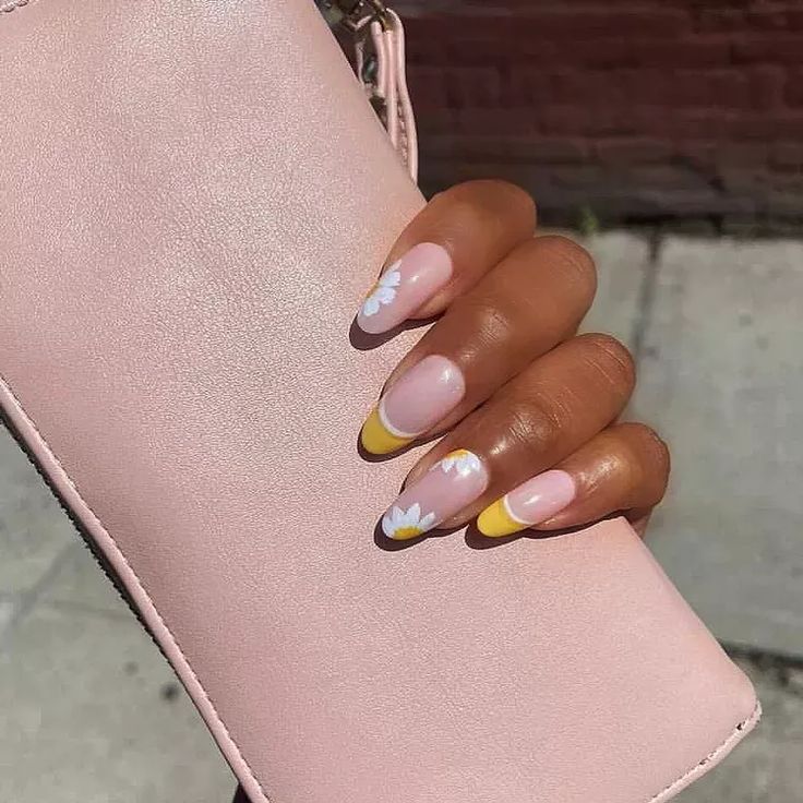 Manicure with pale pink base, yellow French tips, and white and yellow floral designs Lemonade Nails, Yellow French Tips, Early 2000s Trends, Yellow French, Red Weave, Orange Palette, Yellow Smiley Face, Tie Dye Nails, Pink Manicure