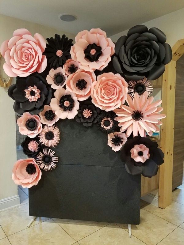 a black box with pink and black flowers on it is displayed in an instagram