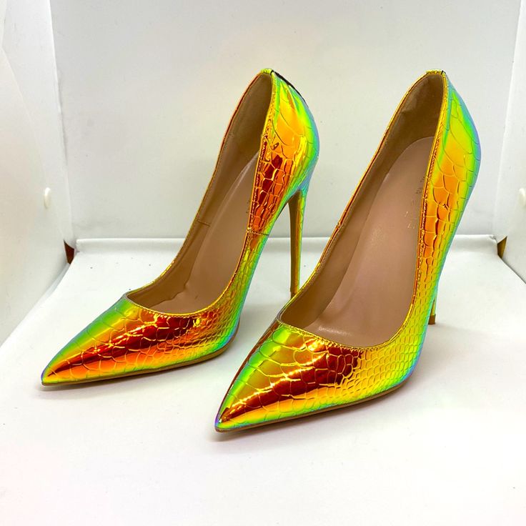 New Iridescent Heels Size 8.5. 4.5” Heel. New Never Worn, No Blemishes. Iridescent Pointed Toe Heels For Party, Orange Pointed Toe Heels For Night Out, Spring Iridescent Pointed Toe Heels, Rainbow Pointed Toe Heels, Vibrant Party Heels With Round Toe, Iridescent Heels, Prom 2024, Blue Orange, Shoes Women Heels