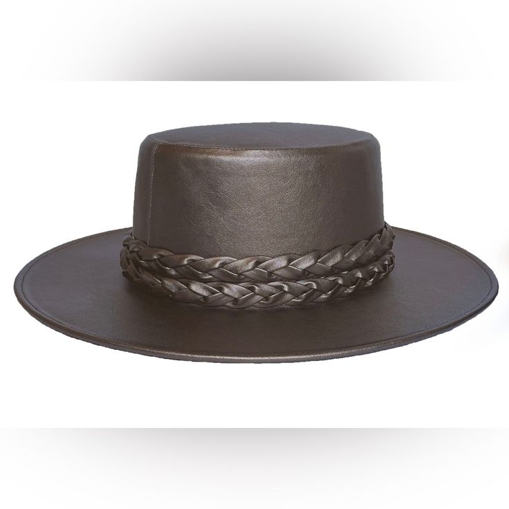 The Structured Design Of The Moonlight Hat Is Composed Of Metallic Vegan Leather That Is Soft To The Touch. Finished With A Statement Double Braid, It's An Updated Take On The Classic Spanish Cordobes Hat. Vegan Leather. Stiffened Body Large - 61 Cm, Medium - 58 Cm Brim 3" Crown 4" Cordobes Crown Double Braided Trim Inner Elastic Spot/Clean With Cloth *Small Scratch As Shown In Last Picture Double Braid, Leather Hat, Structured Design, Anthropologie Accessories, Leather Hats, Vegan Leather, Anthropologie, Braids, Crown