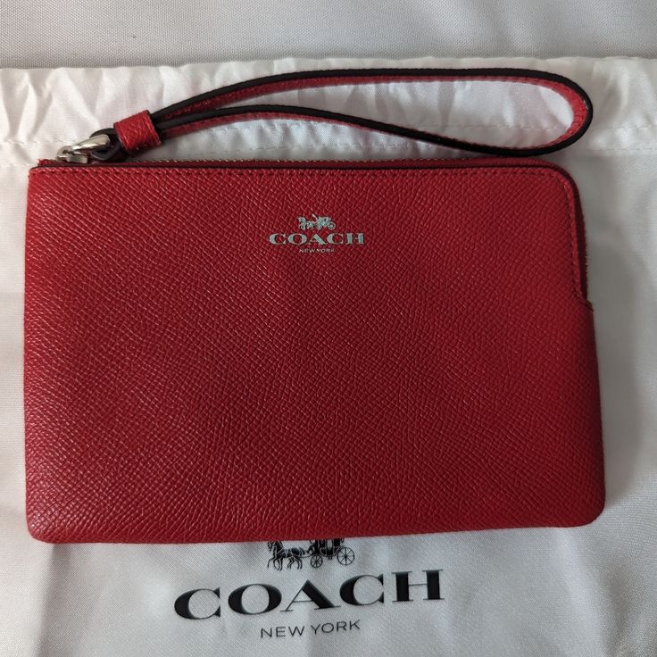 Brand New Coach Small Authentic Wristlet . Red Clutch Wristlet For Everyday, Red Clutch Wristlet With Zipper, Red Clutch Wristlet With Zipper Closure, Red Wristlet With Removable Pouch For Daily Use, Red Wristlet With Removable Pouch For Travel, Red Pouch Wallets With Wrist Strap, Red Clutch Wristlet With Removable Pouch, Red Clutch Wristlet For Travel, Red Wristlet Clutch With Removable Pouch