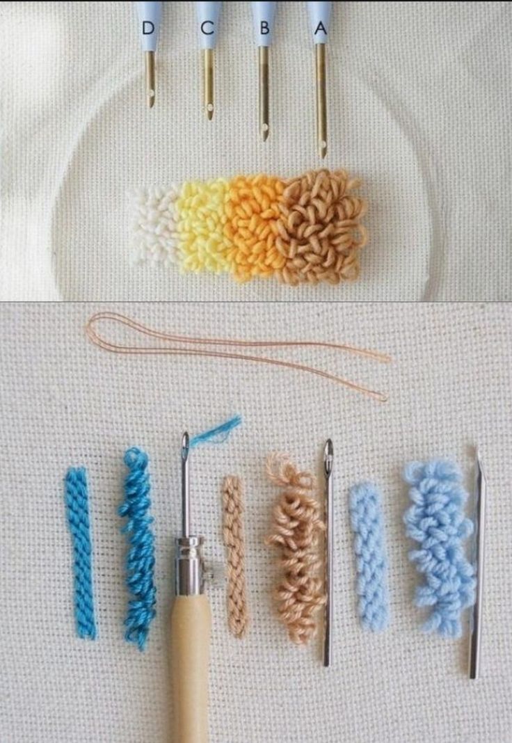 crochet hooks and yarns are arranged on a table next to each other