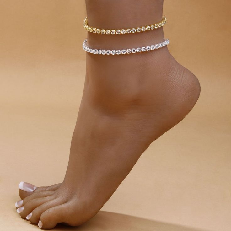 The Rhinestone Tennis Chain Anklet A glamorous and sophisticated accessory that's perfect for any occasion. Crafted with high-quality materials, this anklet features a delicate silver chain adorned with sparkling rhinestones that catch the light beautifully. The adjustable design ensures a comfortable fit, making it easy to wear all day long. Add a touch of elegance and sparkle to your outfit with this stunning piece of jewelry. Rhinestone Anklet, Diamond Anklet, Womens Ankle Bracelets, Anklet Gold, Beautiful Anklet, Leg Chain, Silver Anklet, Tennis Chain, Silver Anklets