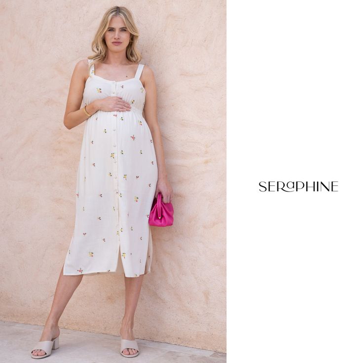 Seraphine's embroidered button-down midi dress features a cool, comfy silhouette in a flexible fit and the prettiest flower motif, perfect to see you through those spring-summer days in effortless style. Casual Midi Dress With Floral Embroidery For Spring, Casual Embroidered Midi Dress For Spring, Nursing Friendly Knee-length Summer Dresses, Spring Maternity Midi Dress Knee-length, Summer Midi Dress For Maternity Wear, Spring Midi Dress With Floral Embroidery For Daywear, Summer Maternity Midi Dress, Spring Floral Embroidery Midi Dress For Daywear, Casual Midi Dress With Floral Embroidery For Daywear