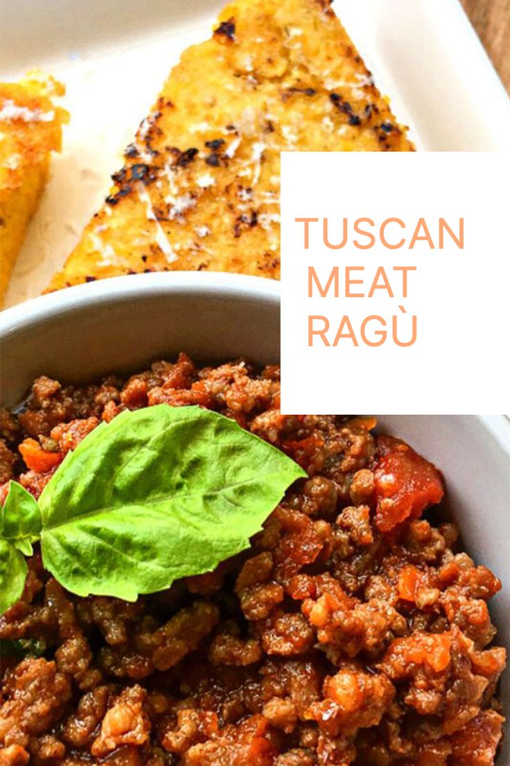 a close up of a bowl of food with bread in the background and text overlay that reads tuscan meat ragu