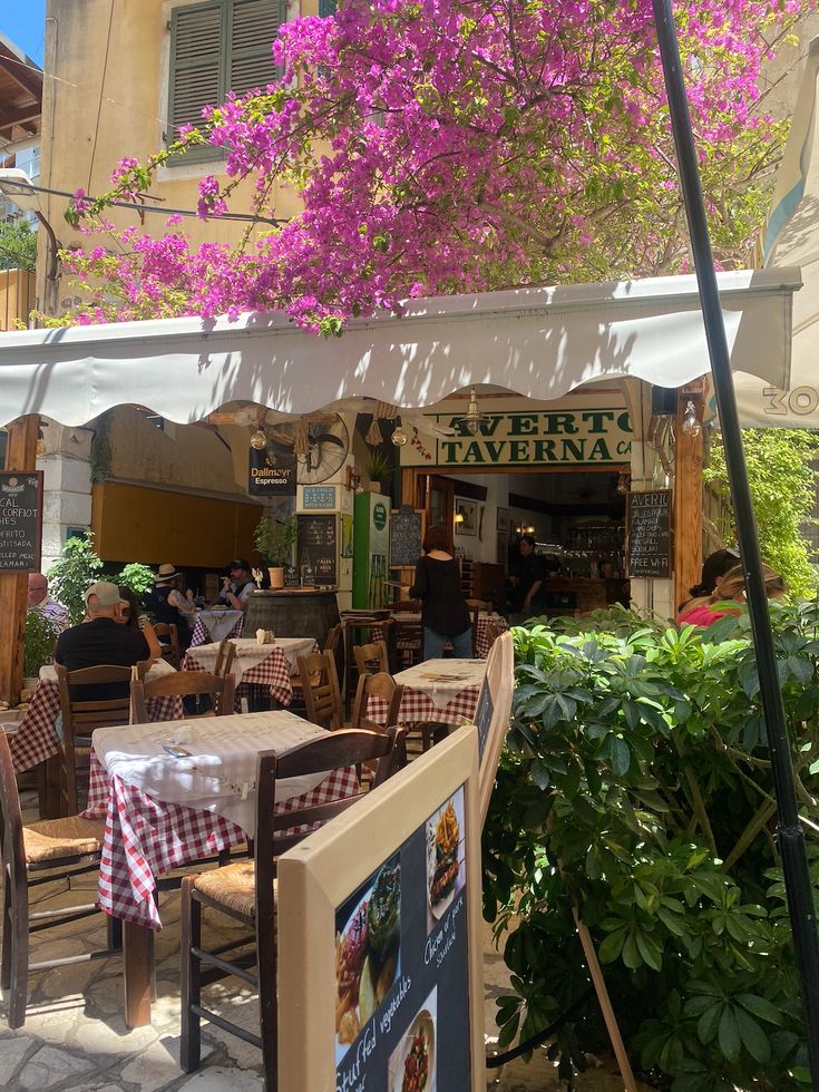 little restaurant in Corfu, Greece Greece Town Aesthetic, Living In Greece Aesthetic, Greece Trip Aesthetic, Corfu Restaurants, Corfu Greece Aesthetic, Summer In Greece Aesthetic, Corfu Old Town, Greece Aesthetics, Aesthetic Greece