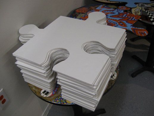 a stack of white paper sitting on top of a table