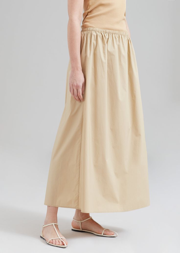 Color: Incense Lightweight crisp woven cotton fabric Relaxed fit Maxi length High waisted style Elasticated drawstring waistband Slip-on style Unlined 100% Organic Cotton Gentle Machine Wash By Malene Birger. Imported Cotton Maxi Skirt With Drawstring And Relaxed Fit, Cotton Maxi Skirt With Drawstring, Spring Maxi Skirt With Gathered Waist, Cotton Long Skirt With Drawstring, Cotton Drawstring Tiered Skirt, Cotton Tiered Skirt With Drawstring, Chic Cotton Skirt With Drawstring, Casual Daywear Maxi Skirt With Gathered Waist, Casual Cotton Skirt With Gathered Waist