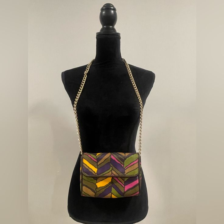 *100% Cotton Crossbody Bag *Height: 5” Width: 7” *20” Gold Chain Strap *Snap Closure *1 Inner Slip Pocket *New With Tag *Abstract Print Evening Multicolor Shoulder Bag With Adjustable Strap, Multicolor Crossbody Flap Bag, Chic Multicolor Shoulder Bag With Adjustable Strap, Chic Multicolor Crossbody Bags, Multicolor Crossbody Shoulder Bag For Evening, Multicolor Travel Shoulder Bag With Chain Strap, Purple Clutch Shoulder Bag With Detachable Strap, Purple Everyday Bag With Chain Strap, Everyday Purple Shoulder Bag With Chain Strap