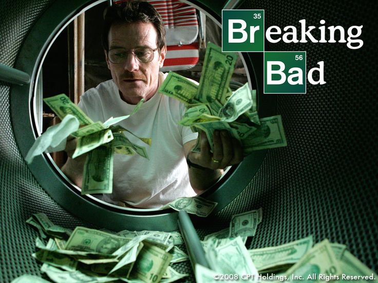 a man looking through a magnifying glass with money in front of him and the words breaking bad on it