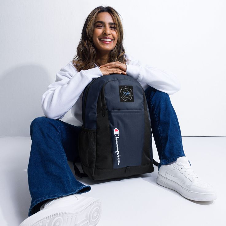 Get ready to make a statement on campus with our Champion 'Self-Discovery' Backpack. Perfect for going back to school, college, or university in style. This backpack combines comfort and durability with a sleek design to keep your essentials organised while showcasing your unique identity. It's the ultimate accessory for navigating urban adventures and expressing 'who you are' in the classroom and beyond. Perfect For:  Matching up with our 'Self-Discovery' themed Stainless Steel Water Bottle. Ma Champion Backpack, Champion Brand, College Backpack, Comfortable Design, Brand Label, Streetwear Style, Pocket Top, Style Streetwear, Backpack Purse